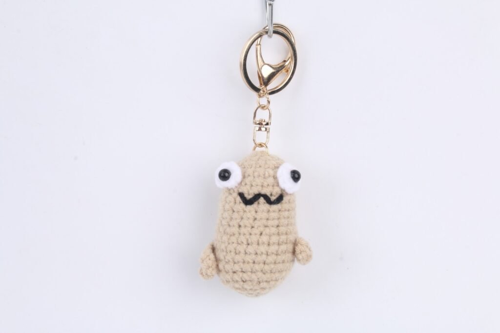 Crochet Beige Smiling Character Keychain